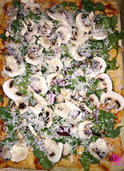 dandelion pizza, dandelion, greens, onions, red onions, mushrooms, sliced mushrooms, colander, gourmet, gourmet pizza, gourmet pizza at home, meatless pizza, vegetarian pizza, veggie pizza, shell, cheese, romano cheese, fresh grated cheese, food, food blogger, dana vento, dandelion green pizza, veggie pizza with dandelion greens, recipe, recipes, foodies, easy to make