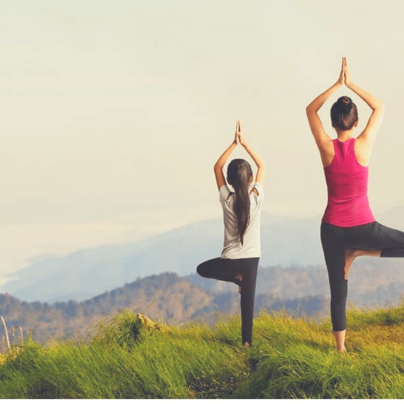 yoga people on mountain - Outdoor activities 