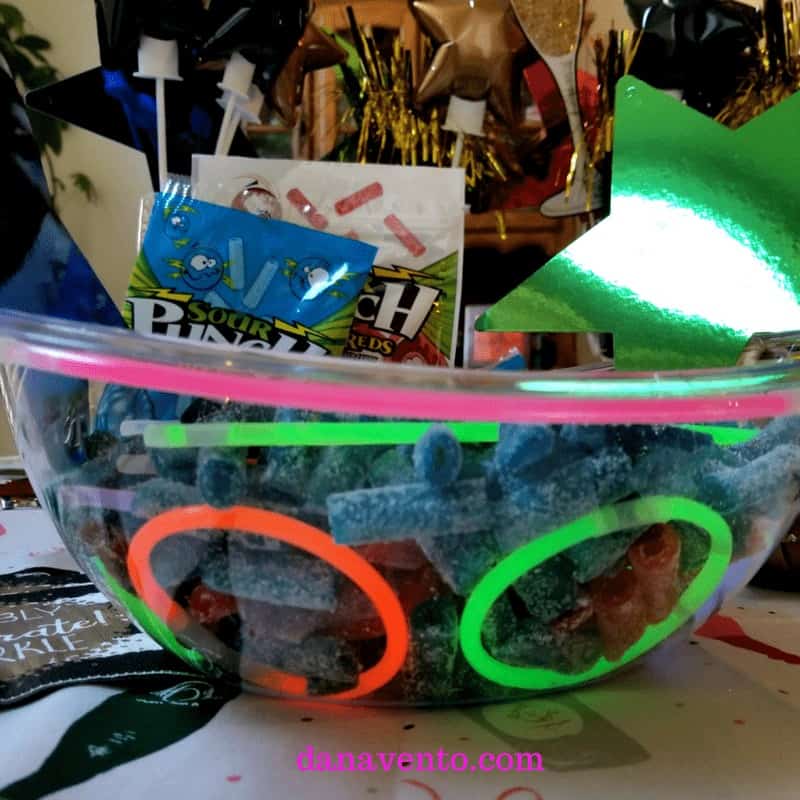 How to make a sweet and sour glow in the dark party bowl, DIY, CANDY, sweet treat, treat yourself, holiday diy, crafting, food, parties, New Year's Eve, Celebrations, Holiday Parties, partying, glow, glow in the dark, glow sticks, Sour Punch® Bites®, Blue Assorted Bites® , Raging Reds Bites®, food and decor, decor for parties, fast decor, easy diy, holiday fancy, holiday light up decor, no batteries required, fun with food, creative food presentation, how to present party bowls, glow in the dark, bowls that glow in the dark, glow in the dark food bowls, party, parties, food for parties, sweet treats for parties, sweet treats for your, Sour Punch, Sour Punch Red, Sweet and Sour treats, chewy, gummy like