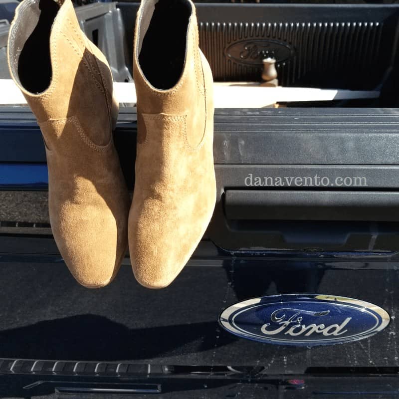 booties handing on back of a Ford Truck 