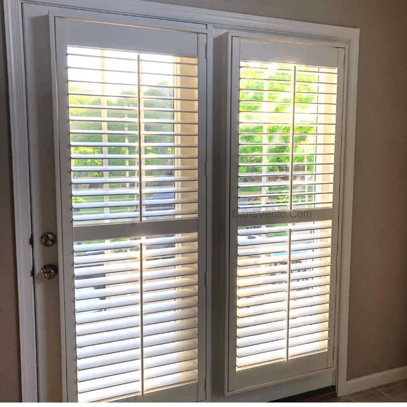 French door faux plantation shutters installed with the slats open