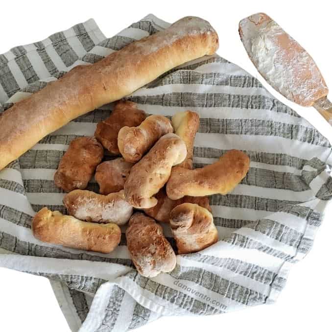 beginner's easy French baguette bread recipe baked on bread towel