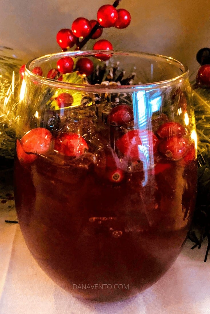 Pop in the Cherry Christmas Amaretto Cocktail a glass filled with holiday cheer