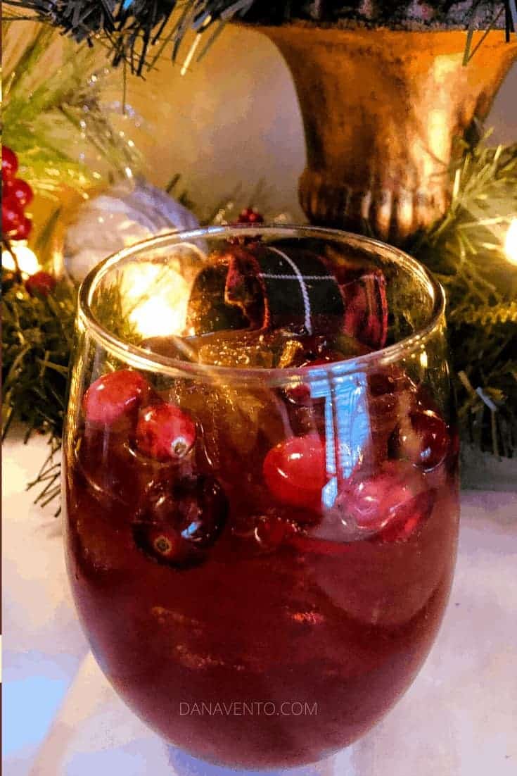 Festive cherry Christmas amaretto cocktails in a glass  for every Mrs. Claus out there 