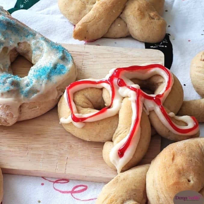 iced cinnamon pretzels with icing in red red and white