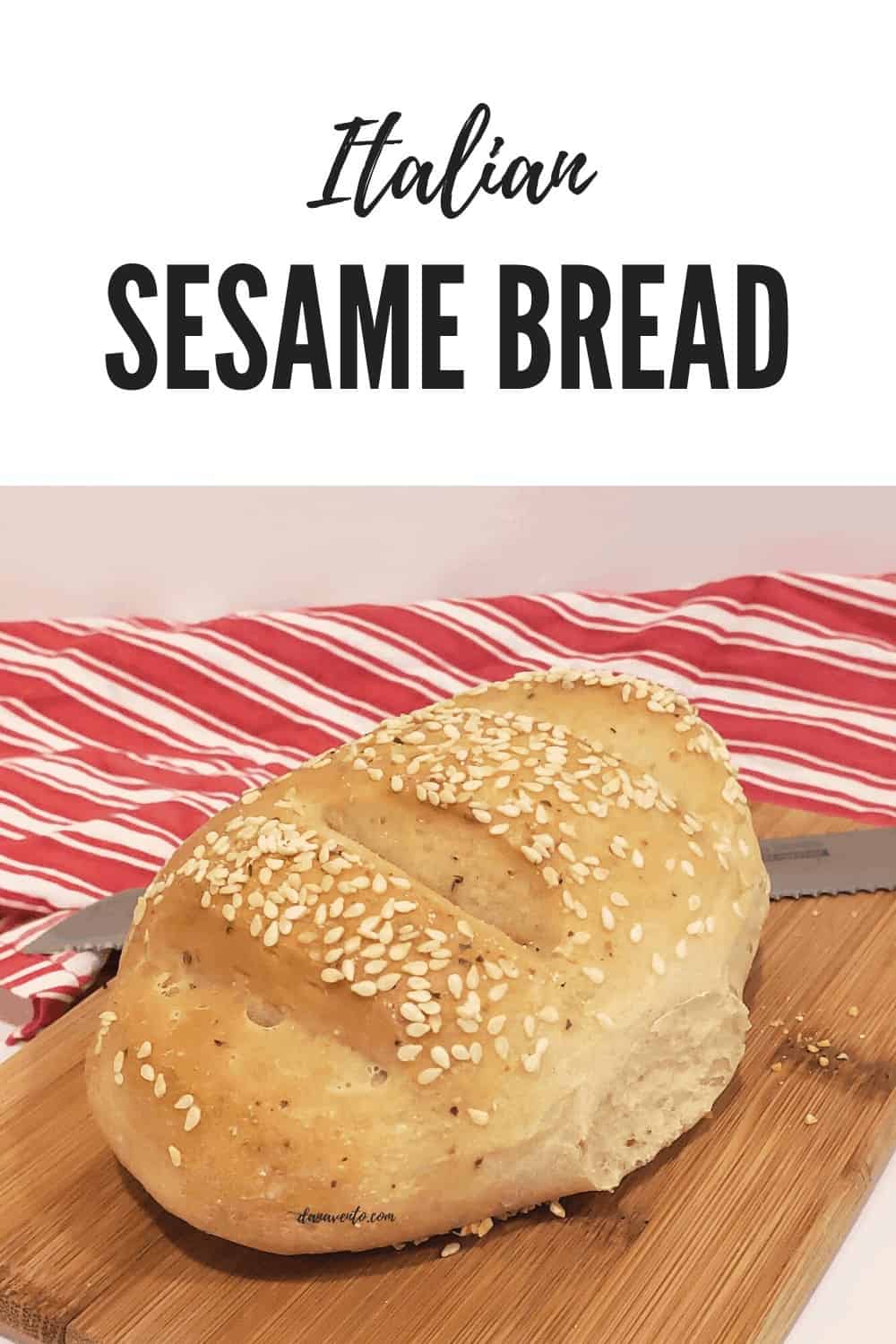 Mini loaves of sesame seed bread  and sesames sticking 