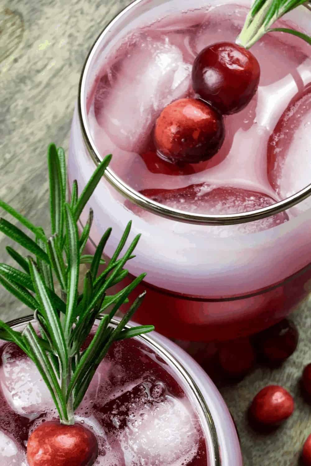 Cranberry Spritzer with rosemary garnish 