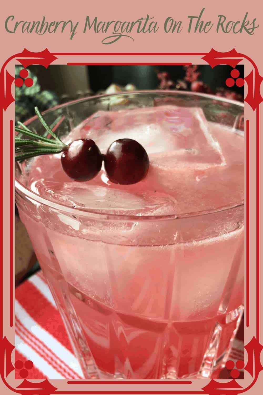 2 cranberries on Rosemary sprig
