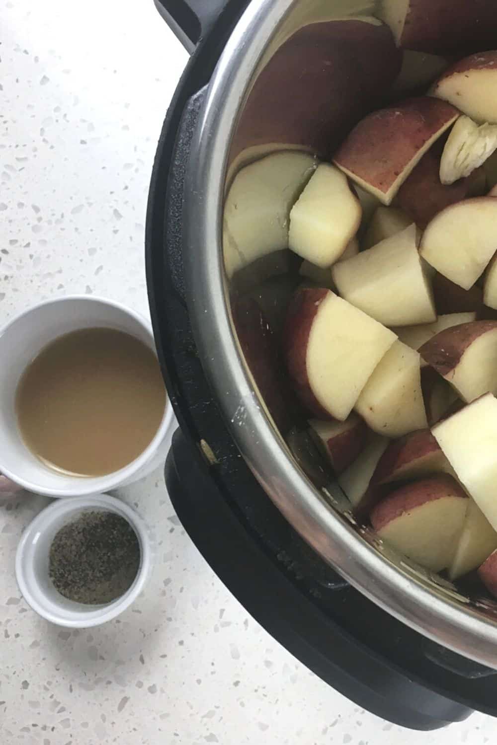 pepper and broth with potato cubes