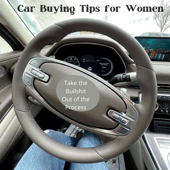 car buying tips for women behind steering wheel