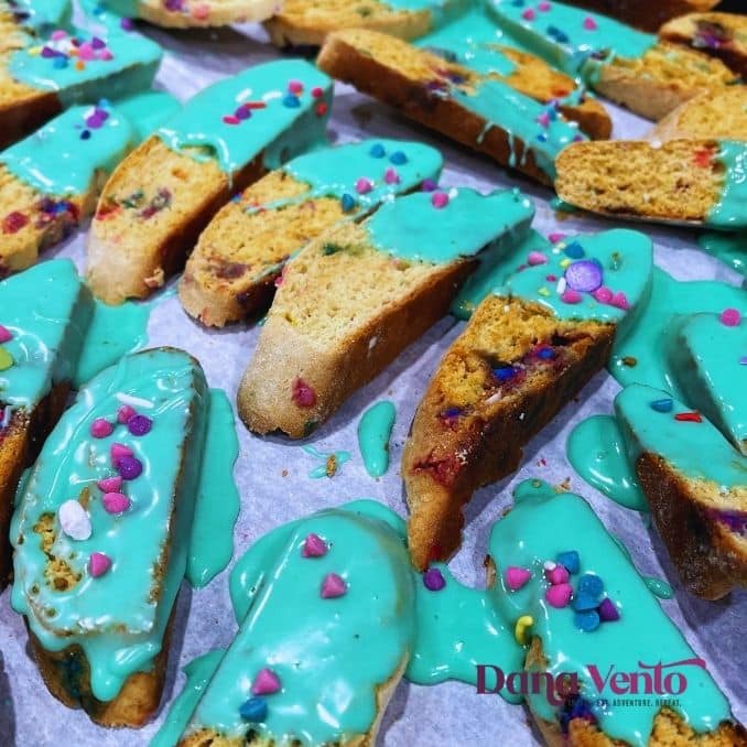 birthday cake biscotti sliced and iced