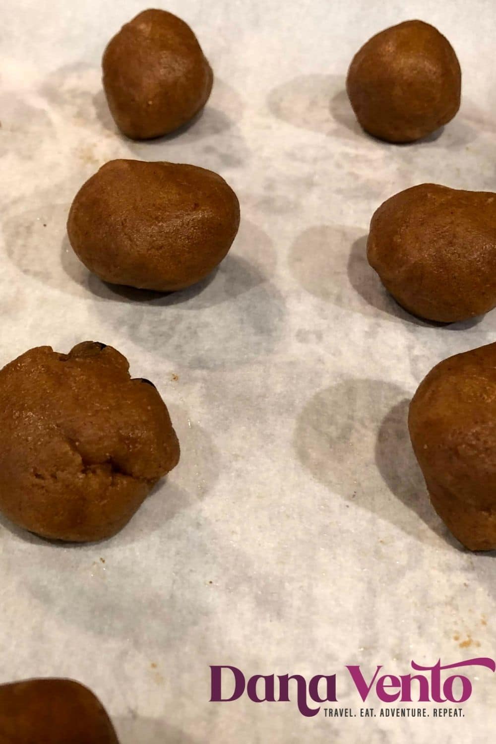 PARCHMENT PAPER AND SIMPLE PEANUT BUTTER COOKIES IN BALLS