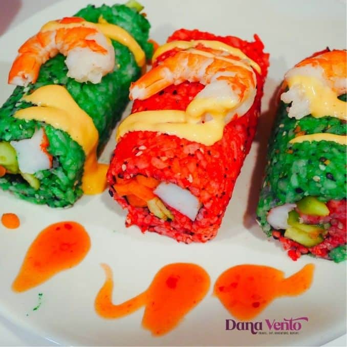 holiday green and red sushi on plate sushi rolls