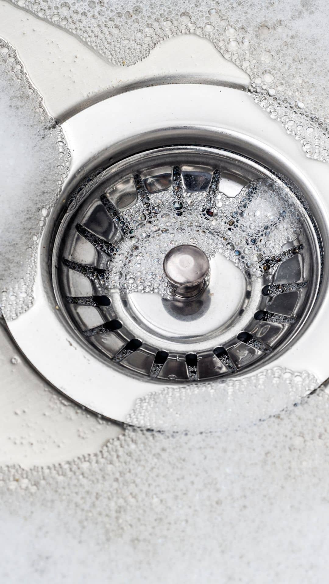 soap scum in sink drain leads to gunk buildup