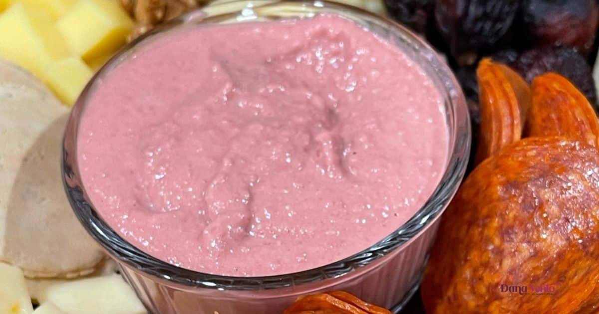 plant-based beet hummus in glass container