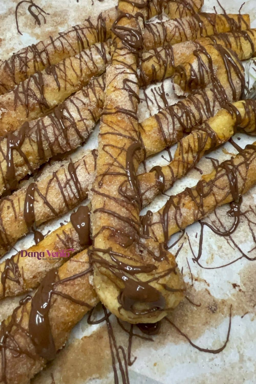 receta Churros with chocolate drizzle