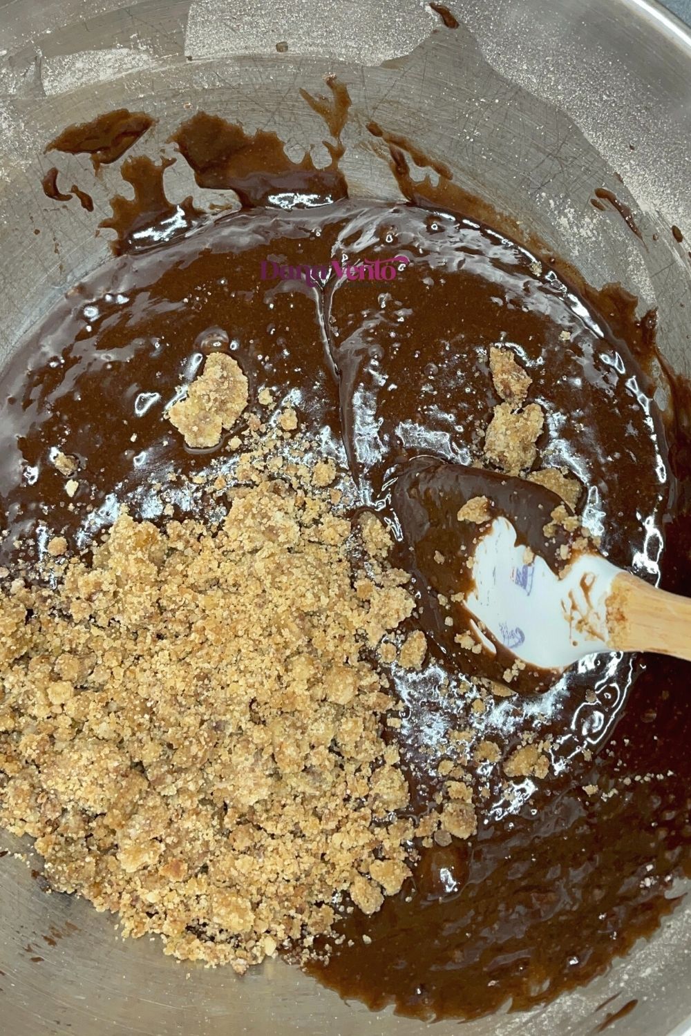 swirling the chocolate brownies with the churro crumbs
