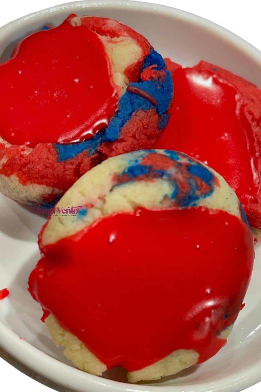 Mouthwatering patriotic red white blue thumbprint cookies showcasing festive colors of red, white, and blue