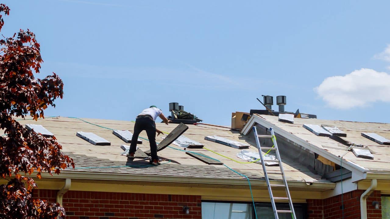 Company working to Maintain your roof