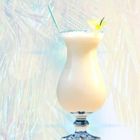 The Tropical Escape Cocktail with sunlight behind