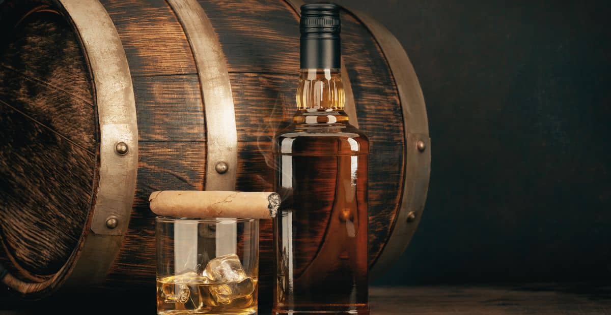 cigar and bourbon bottle