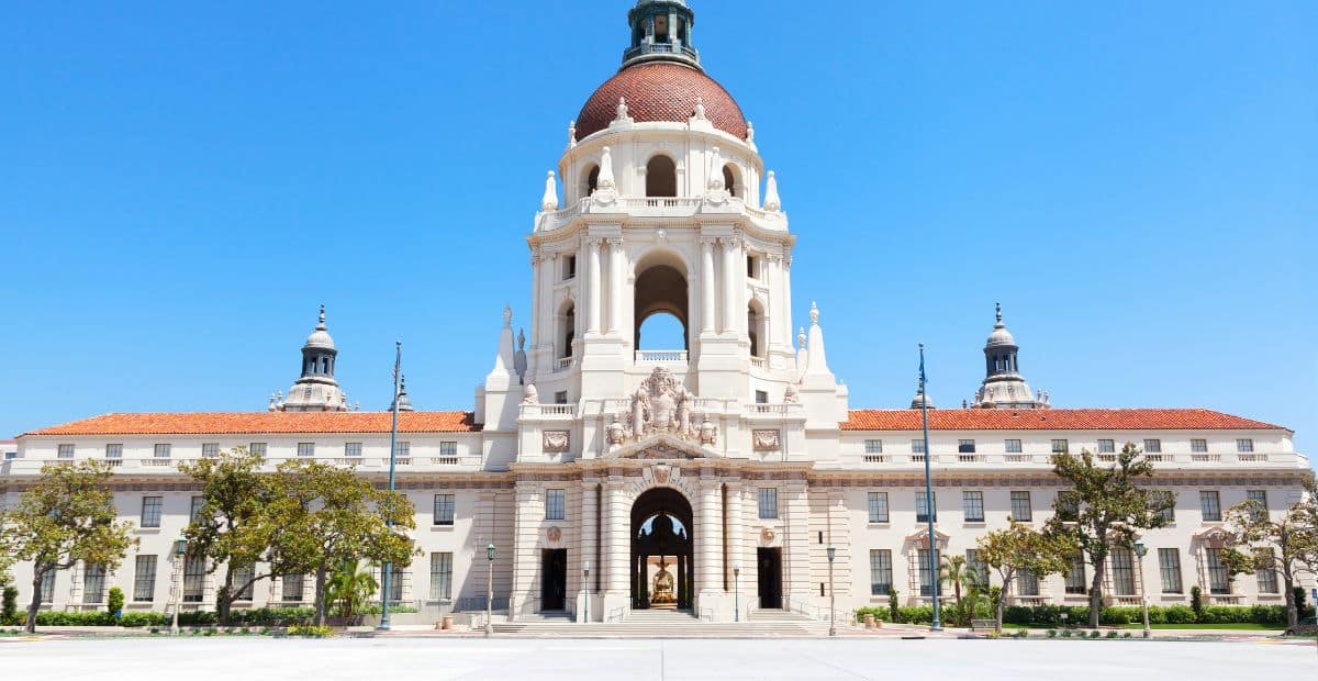 The sunlit facade of the historic Pasadena City Hall embodying the city's architectural grandeur