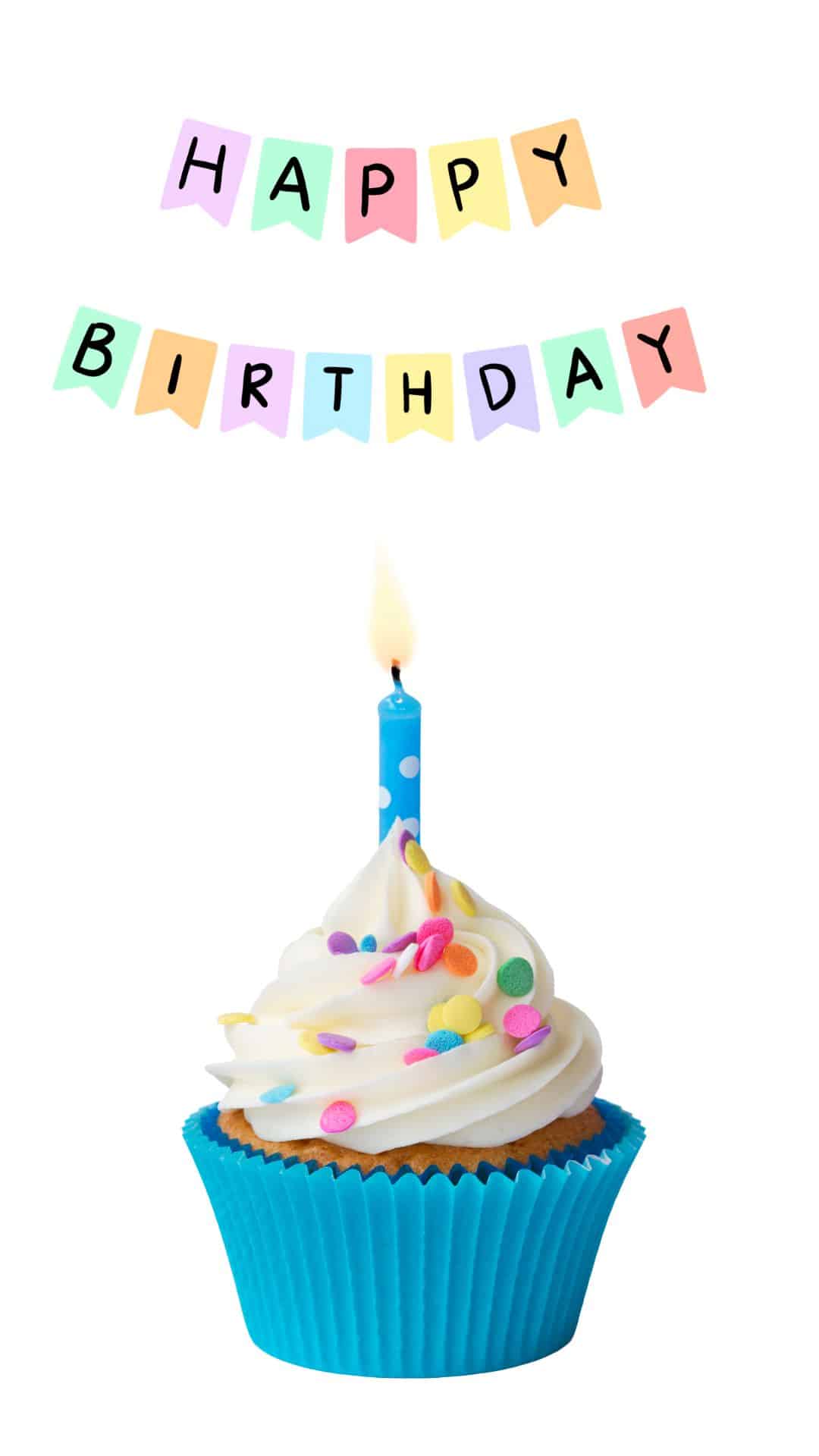 Birthday party cupcakes with colorful frosting, lit candles, and floating gold, white, and teal balloons against a blue background