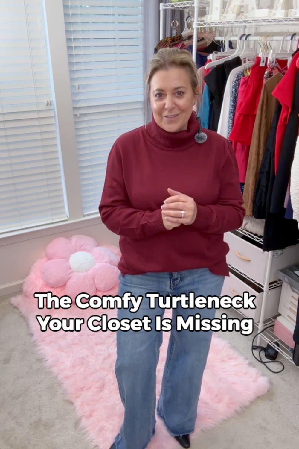 15 Random Amazon Products Selling Hot This September 4 Woman wearing a ribbed long-sleeve turtleneck sweater in burgundy, styled with jeans in a closet room—soft, stretchy fall layering top.